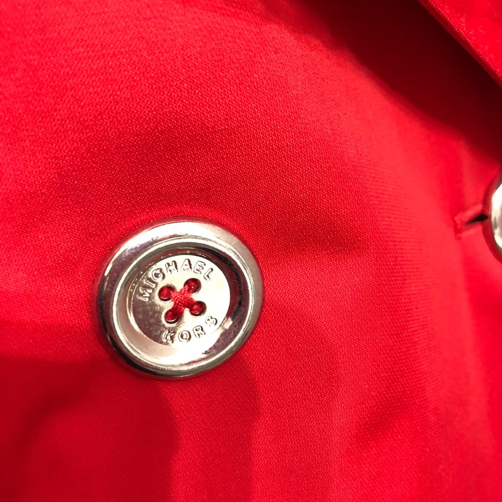 Red Michael Kors trenchcoat